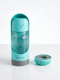 Teal Aethal portable pet water bottle with built-in filter and attached drinking cup