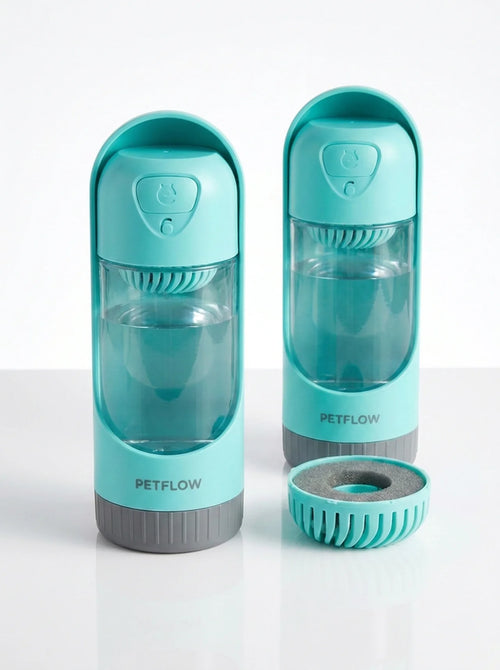 Close-up of the portable dog water bottle showing the filter and cup design